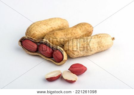 peanuts on a white background. peanuts in the husk.