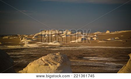 Night photography of the Abstract nature rock formations aka sculptures in White desert at Sahara, Egypt