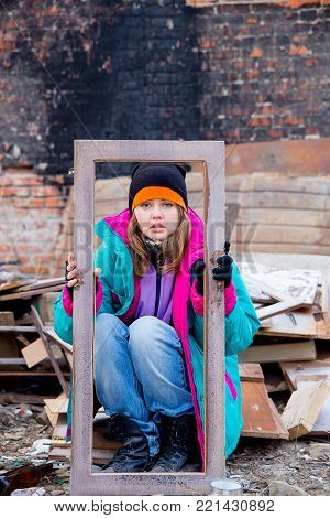 A portrait of a homeless hungry woman
