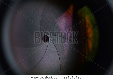Fragment of a portrait lens for a modern SLR camera. A photograph of a wide-aperture lens with a focal length of 50mm