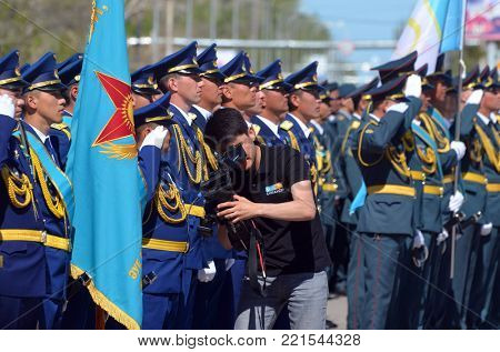 Karaganda-TV operator.Kazakhstan army parade.V-day celebration.Sary Shagan.Former Soviet anti-ballistic missile testing range.Kazakhstan.May 9, 2017.Priozersk.Kazakhstan