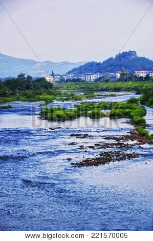 The Chongyang Brook on the edge of the city Wuyishan China in Fujian Province.