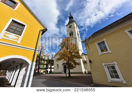 SPITTAL AN DER DRAU/ AUSTRIA - OCTOBER 8, 2017. Old bell tower of the church Maria Verkuendigung in the historical downtown. Town of Spittal an der Drau, federal state of Carinthia, Austria.