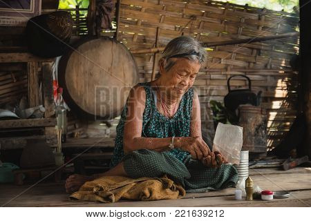 Asia old woman living in the countryside .The way of life of rural people in Thailand.