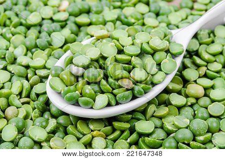 The Green split peas in white spoon.