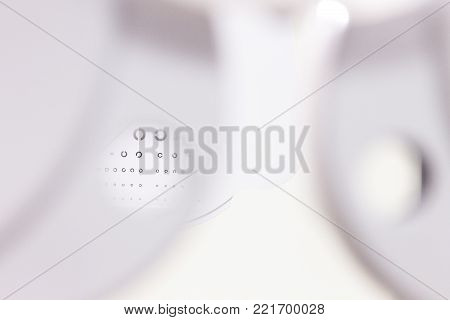 the cabinet of the eye doctor. eye sight test called landolt C. with copy space