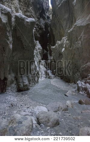 Turkey, Canyon Saklikent, at the bottom of the canyon the river flows, and in the foreground large stones