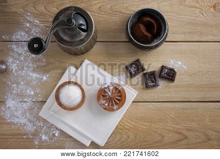 the coffee grinder on a wooden table