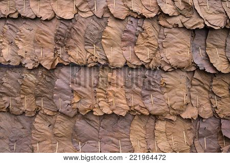 Wall made from dry leaves in the countryside of Thailand
