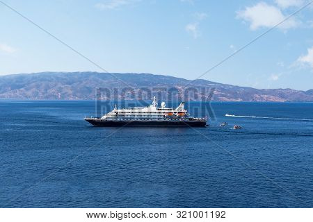 Beautiful Greek Landscape Of A Cruise Ship On Hydra, Greece.