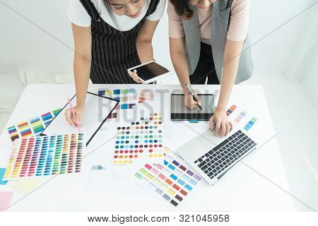 Coworking Process. Designers Team Working Modern Office. Young Creative Manager Showing New Startup 