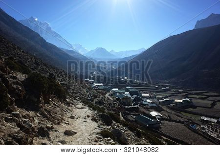 View of Dingboche village (4410 m) in early morning sun from the trail of Everest trek, Sagarmatha national park, Nepal