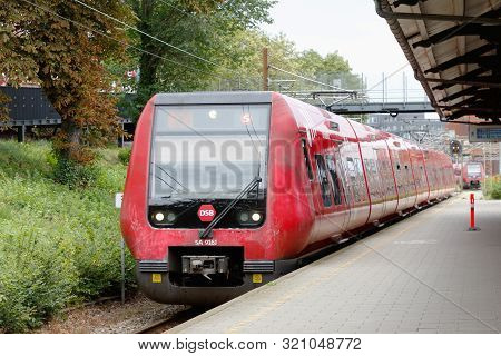 Copenhagen, Denmark - September 4, 2019: One Red S-train Operated By Dsb Arriving At The Osterport R