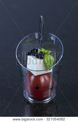 Mini Canapes For Refreshments At Banquets Receptions Catering On A Dark Background.