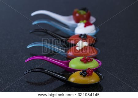 Mini Canapes For Refreshments At Banquets Receptions Catering On A Dark Background.