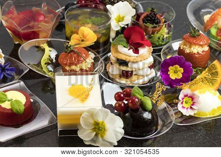 Mini Canapes For Refreshments At Banquets Receptions Catering On A Dark Background.