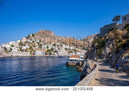 Hydra, Greece - 16 August 2019: Picturesque View At A Restaurant In Port Town Of Hydra Island In Gre