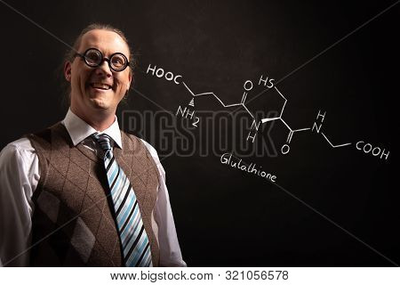 Professor Presenting Handdrawn Chemical Formula Of Glutathione Antioxidant Peptide