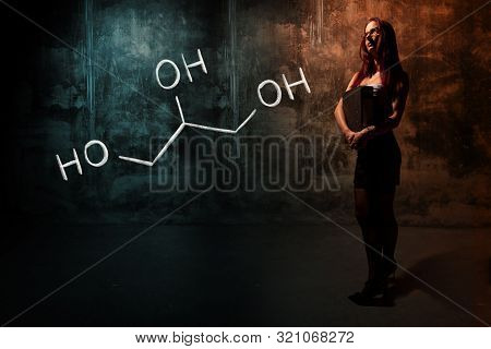 Sexy Girl Or Secretary Or Female Student Presenting Handdrawn Chemical Formula Of Glycerol