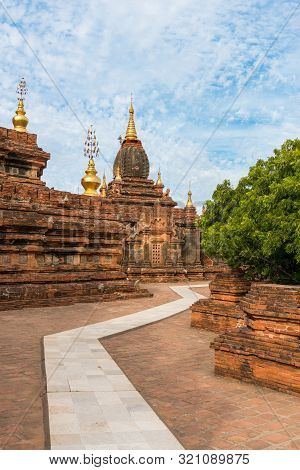 Vertical Picture Of The Exterior Area Of Dhammayazika Pagoda Located Inside The Archeological Park O