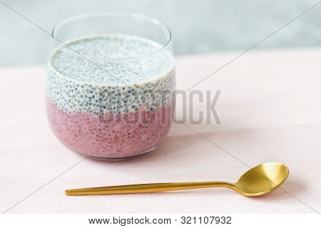 Chia Seed Pudding With Almond Milk, Yogurt And Pitaya Dragon Fruit Powder In A Glass. Superfood And 