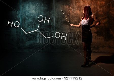 Sexy Girl Or Secretary Or Female Student Presenting Handdrawn Chemical Formula Of Glycerol
