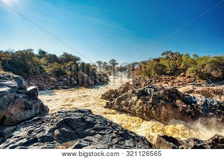 Beautiful Epupa Falls On The Kunene River In Northern Namibia And Southern Angola Border. Sunrise Su