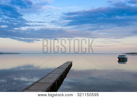 Sunset.panoramic Sky Over Naroch Lake And Pier
