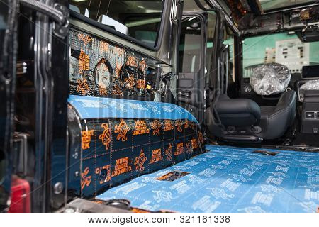Novosibirsk, Russia - 09.09.2019: Car Tuning In The Body Of A Suv Using Three Layers Of Noise Insula