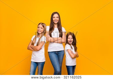 Photo Of Three Sister Ladies Self-confident Crossing Arms Wear Casual Outfit Isolated Yellow Backgro