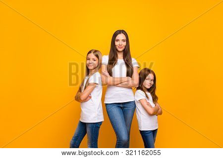 Photo Of Three Sister Ladies Self-confident Crossing Arms Wear Casual Outfit Isolated Yellow Backgro