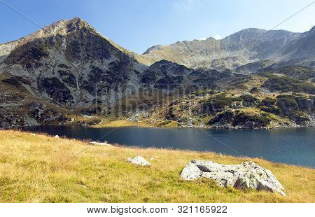 Morning Panoramic Mountain View From Romanian Carpathian Mountains, Bucura Lake And Retezat Mountain