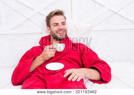 A Fresh Drink For Breakfast. Happy Man Drinking Coffee For Breakfast. Handsome Guy Enjoying His Brea