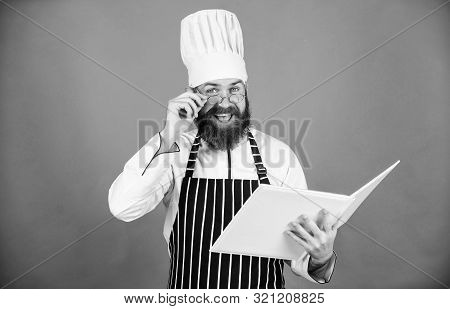 Amateur Cook Read Book Recipes. Culinary Arts Concept. Man Learn Recipe. Try Something New. Cookery 