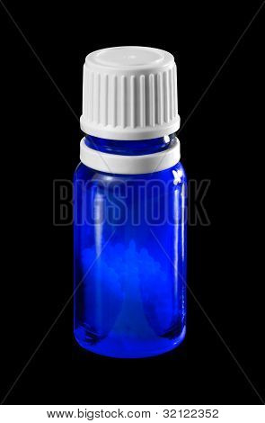 Botella pequeña con los glóbulos