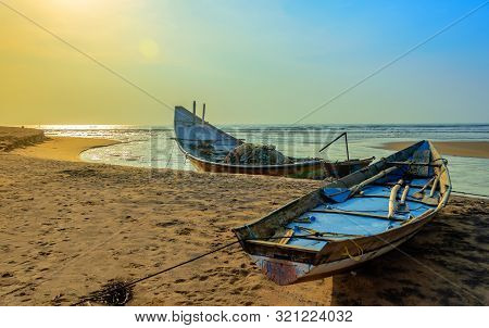 Traditional Colorful Fishing Boat Anchored At The Confluence Of Mahendra Tanaya River And Bay Of Ben