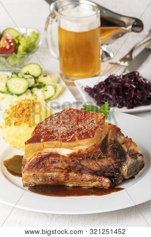 Grilled Frankonian Schaeufele With Dumpling With Beer
