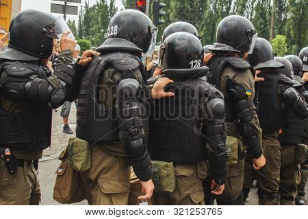 Kiev, Ukraine, 06.23.2019. Police In Protective Helmets And Body Armor Keep Order At The Meeting. Se
