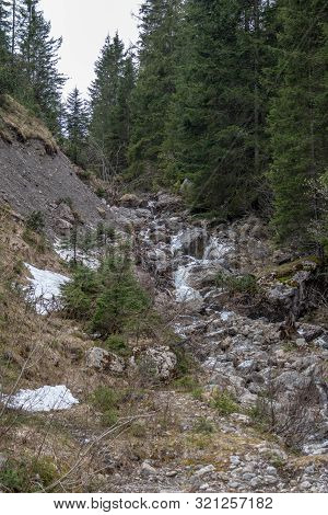 Panorama Of Untouched Landscapes In The Austrian Alps With River, Streams And Waterfalls