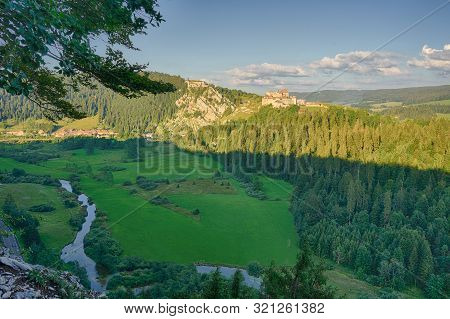 View Of Chateau De Joux, Fort Mahler And The Surrounding Mountains Larmont And Doubs River At Sunset