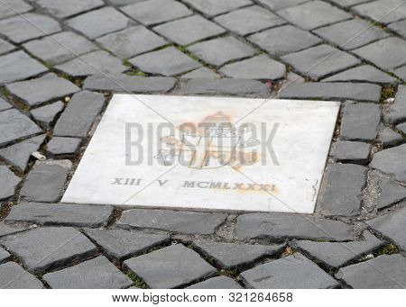 Vatican City, Vatican - March 4, 2019: Small Plaque In Saint Peter Square In The Place Of The Attemp