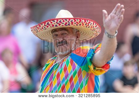 Buckhannon, West Virginia, Usa - May 18, 2019: Strawberry Festival, Man Wearing A Clown Outfit, With