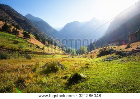 Fann Mountains In Tajikistan. Sunny Mountain Landscape. Scenic Mountains In Sunlight. Bright Nature 