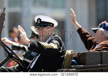Benton Harbor, Michigan, Usa - May 4, 2019: Blossomtime Festival Grand Floral Parade, Man Driving A 