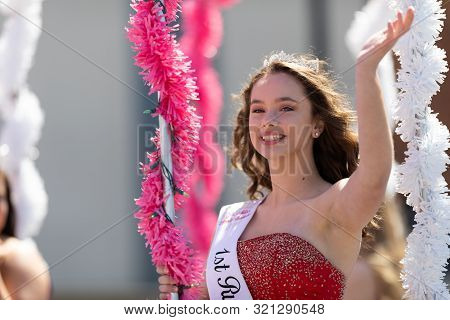 Benton Harbor, Michigan, Usa - May 4, 2019: Blossomtime Festival Grand Floral Parade, Float Carrying