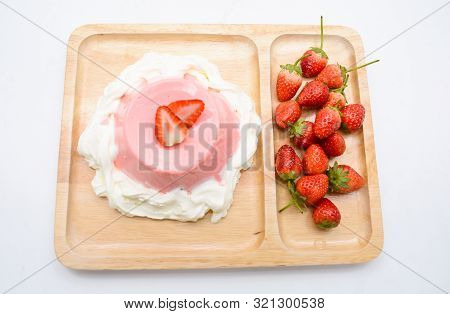 Italian Dessert Pana Cotta With Strawberries And Jam