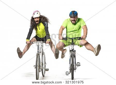 
Two nerdy guys riding on a bike