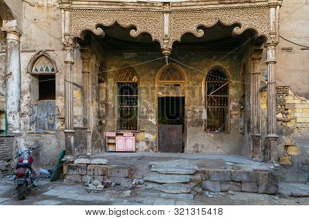 Cairo, Egypt- January 16 2016: Facade Of Bayt Madkour Pasha Historic Abandoned House Located At Souq