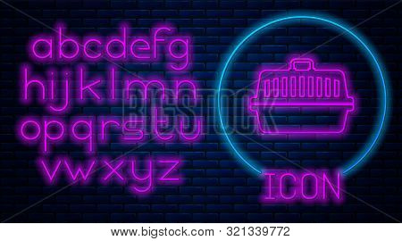 Glowing Neon Pet Carry Case Icon Isolated On Brick Wall Background. Carrier For Animals, Dog And Cat
