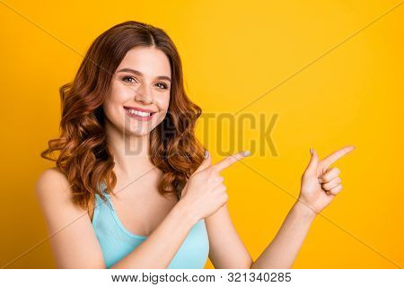 Photo Of Fascinating Charming Pretty Sweet Cute Girlfriend Smiling Toothily Pointing At Emptiness To